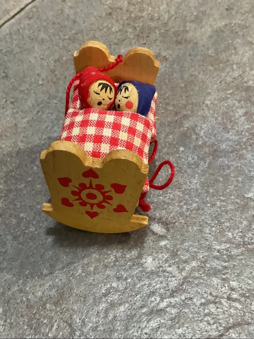 Wooden Holiday Cradle Ornament with Red Gingham Bedding made in Germany